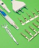 CUSTOM ELECTRICAL TERMINALS FOR OVERMOLDED DEVICES