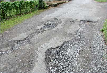 Pothole Detection Using Embedded Self-powered Wireless Sensors