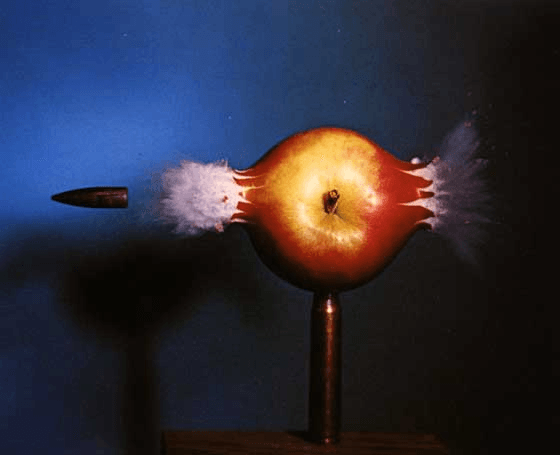 Bullet through apple caught with high speed camera