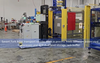 Savant Automation, Inc. - Fork AGVs Servicing Multi-level Storage Rack