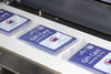 Industrial Indexing Systems, Inc. - Automated Solution for Secure Card Packaging