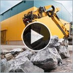 An excavator that can autonomously build walls.