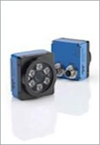 Compact vision system with integrated lens and lighting