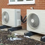 Promoting residential heat pumps for building decarbonization